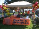 Gavin' Groupies tent with Grandpa stirring the pot of chili