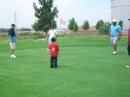 Golfers on the green with Landon